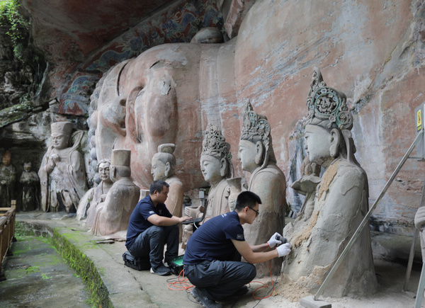 修復(fù)釋迦牟尼涅槃像。大足區(qū)委宣傳部供圖