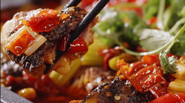 麻辣鮮香的萬州烤魚。萬州區(qū)商務(wù)委員會供圖