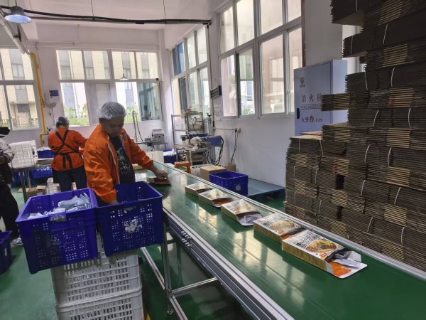 雍禾記包裝生產(chǎn)線。任峰攝